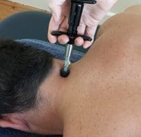 Physiotherapy Instrument Mobilisation using a spring-loaded joint mobilisation instrument