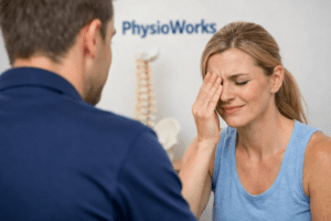 cluster headache patient holding painful eye during physiotherapy assessment