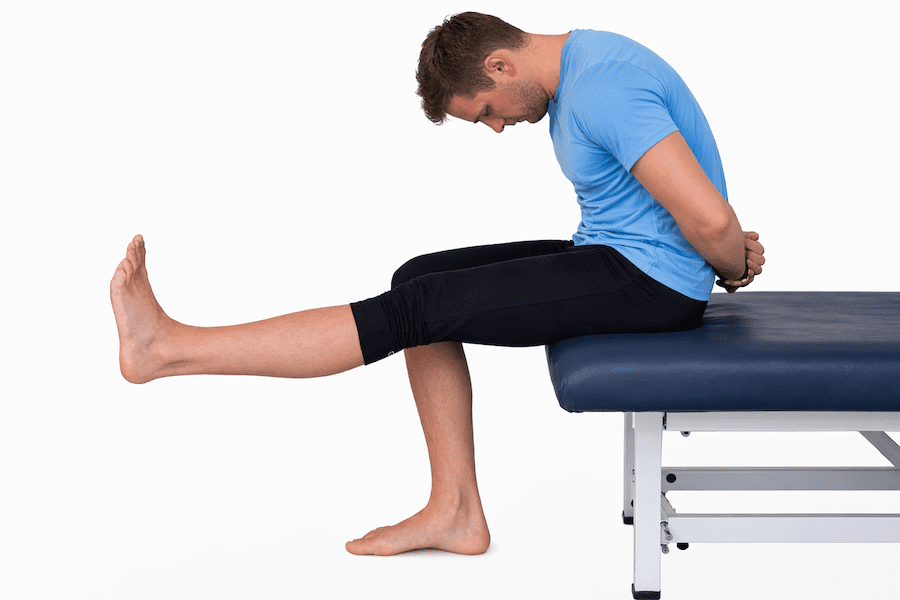 Neurodynamics slump test demonstrating neural tension assessment on a physiotherapy treatment bed