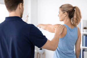 Physiotherapist Clayfield assessing shoulder movement at PhysioWorks Clayfield