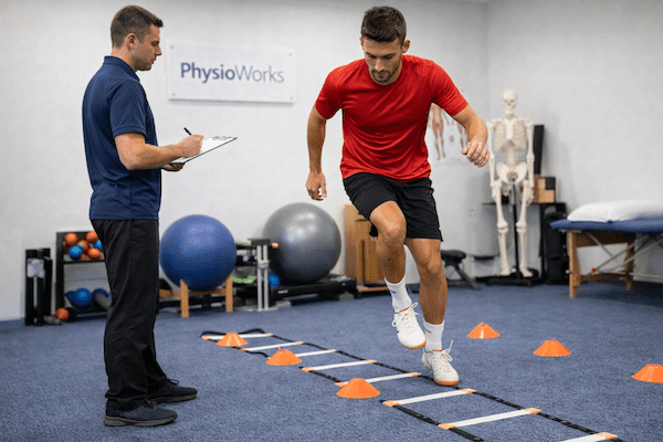 return-to-sport-testing-hop-agility-test-physiotherapy Return to sport testing single leg hop agility test with physiotherapist