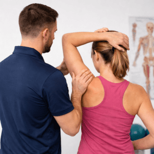 Physiotherapist guiding shoulder mobility exercise for shoulder pain relief