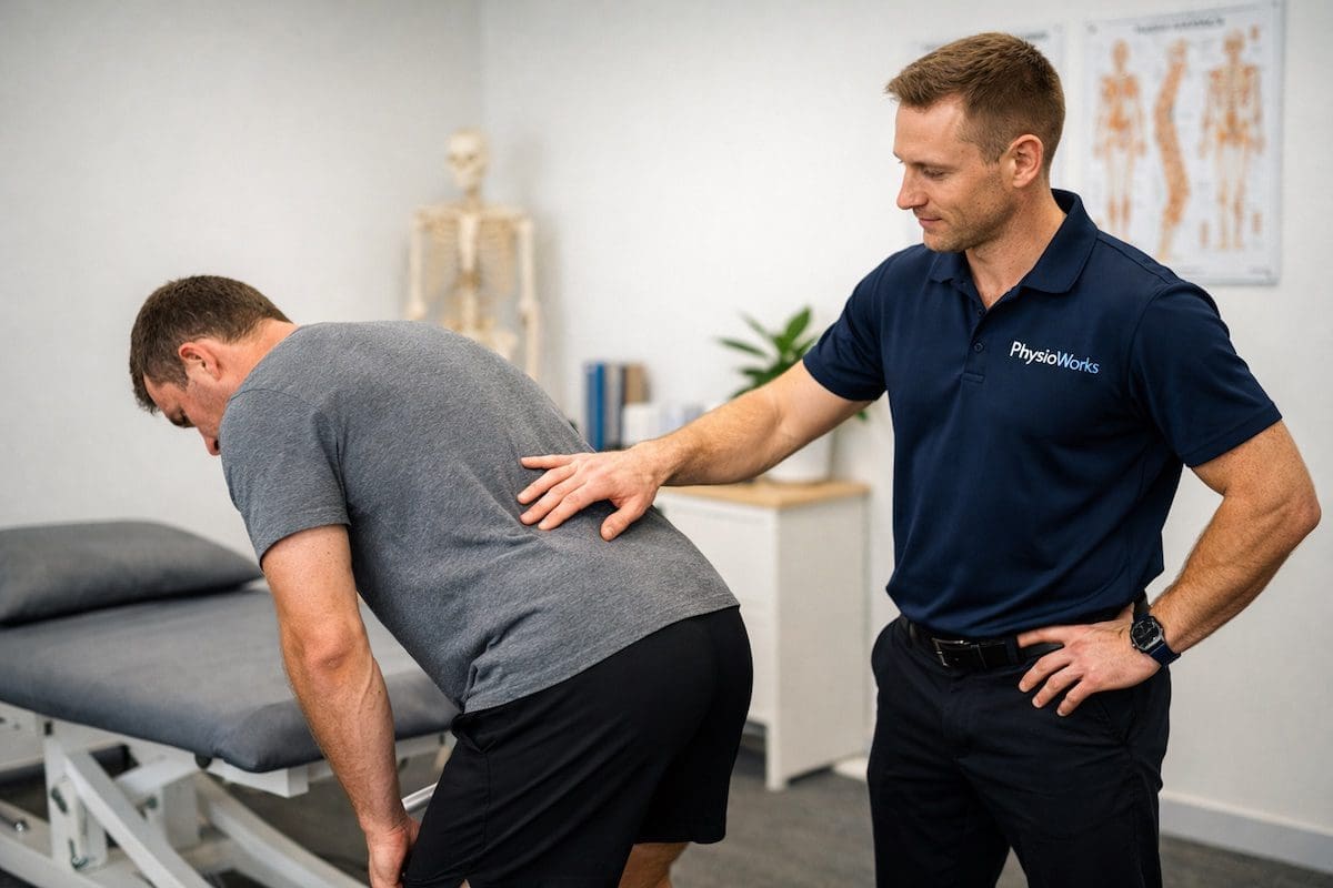 pulled-back-muscle-assessment-physiotherapy pulled back muscle physiotherapy assessment during standing lumbar movement test