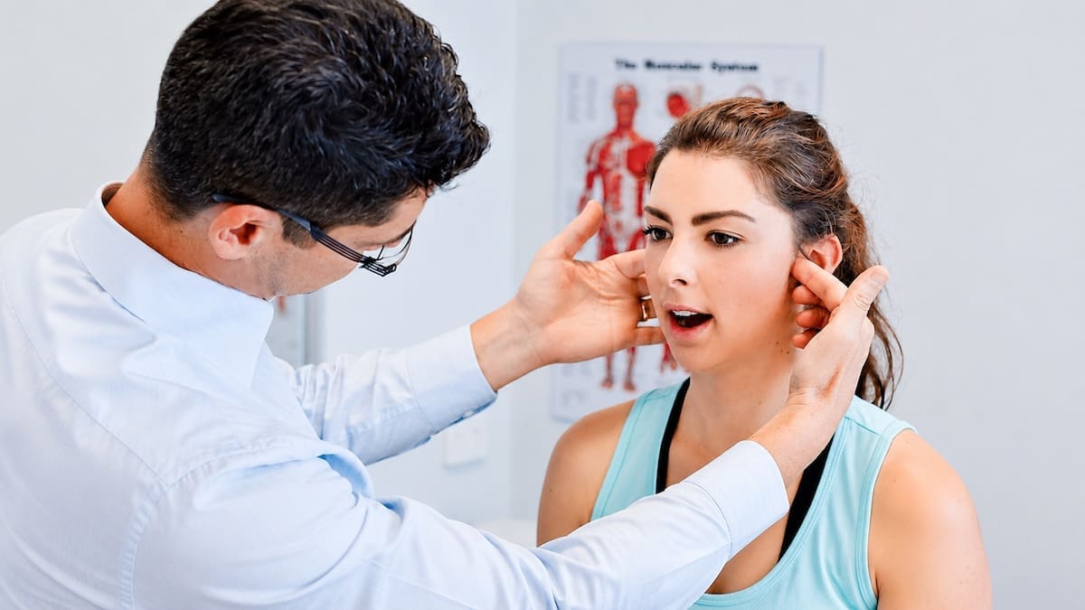 Jaw pain physiotherapy Brisbane assessment of TMJ movement and comfort