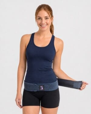 serola-sij-belt-pelvic-support-model Woman wearing a Serola SIJ belt low around her pelvis